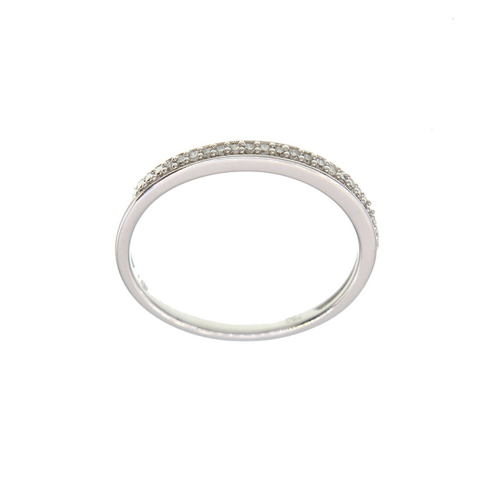 serti grain Diamants 0.06 cts G SI2  en Or 750 / 1000 (18K)
