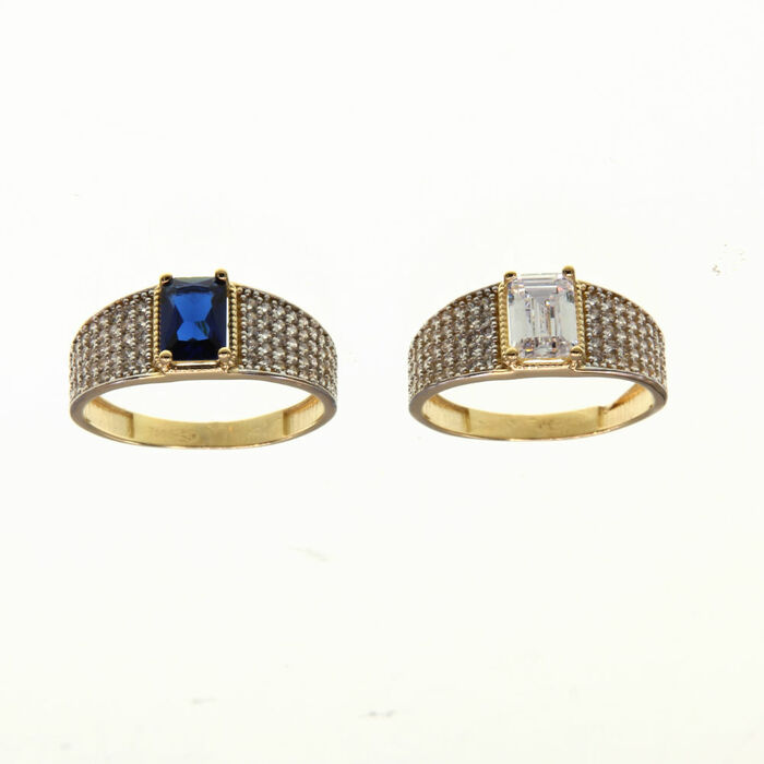 Solitaire accompagne centre taille emeraude Existe en differen tes couleurs  en Or 750 / 1000 (18K)