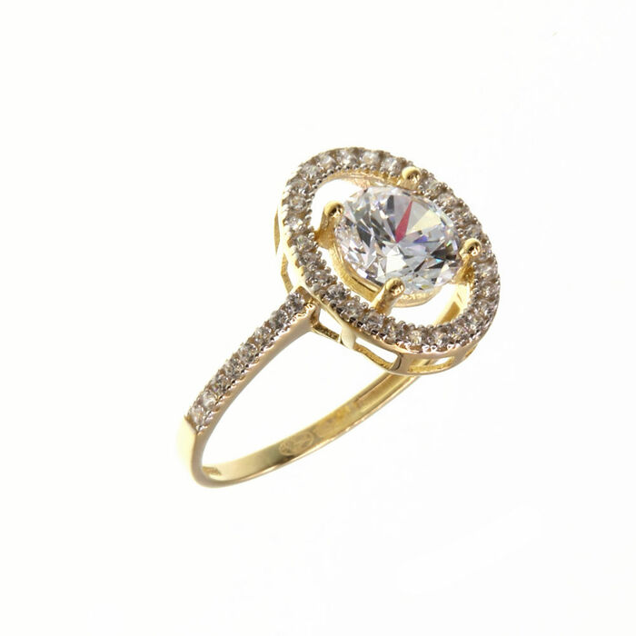 Bague motifSolitaire accompagne avec entourage oval et centre rond  en Or 750 / 1000 (18K)