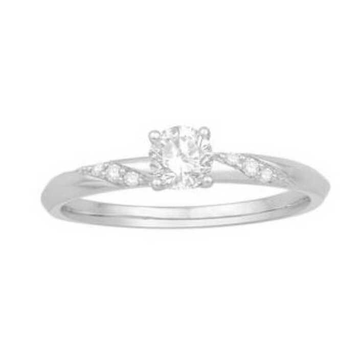 Solitaire accompagné 4 griffes 0.19Cts G SI2  en Or 750 / 1000 (18K)