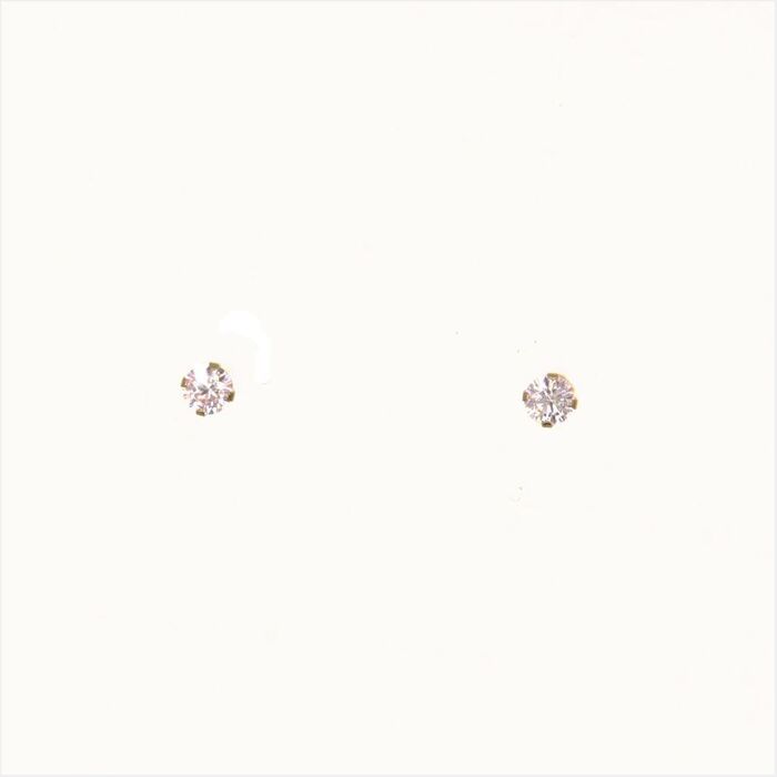 serti 4 griffes  en Or 750 / 1000 (18K)