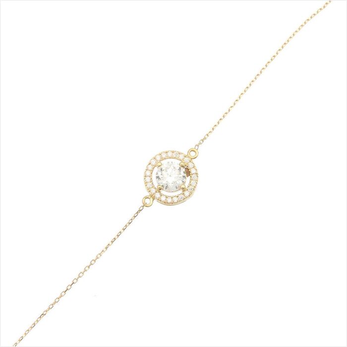 Gourmette entourage rond 4 griffes serti grain  en Or 750 / 1000 (18K)