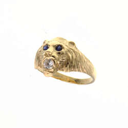 Chevalière tete de lion avec des yeux bleux  en Or 750 / 1000 (18K)