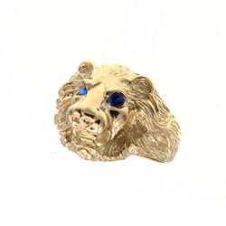 Chevalière tete de lion avec des yeux bleux  en Or 750 / 1000 (18K)