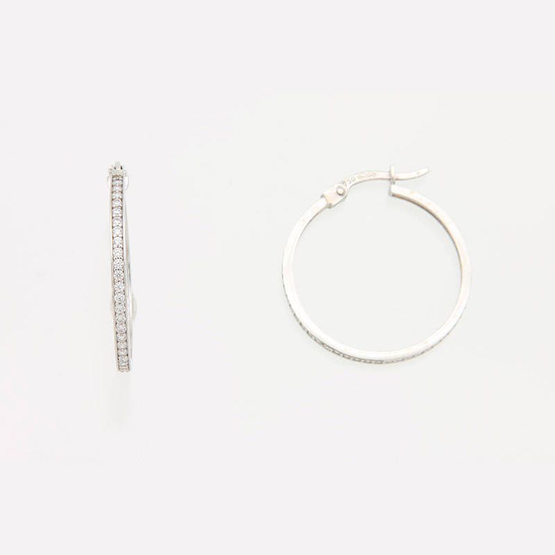 Paire de créoles serti rail en Or 750 / 1000 (18K)